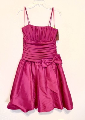 Dancing Queen fuchsia party dress. Straps w/rouged waist & side bow.