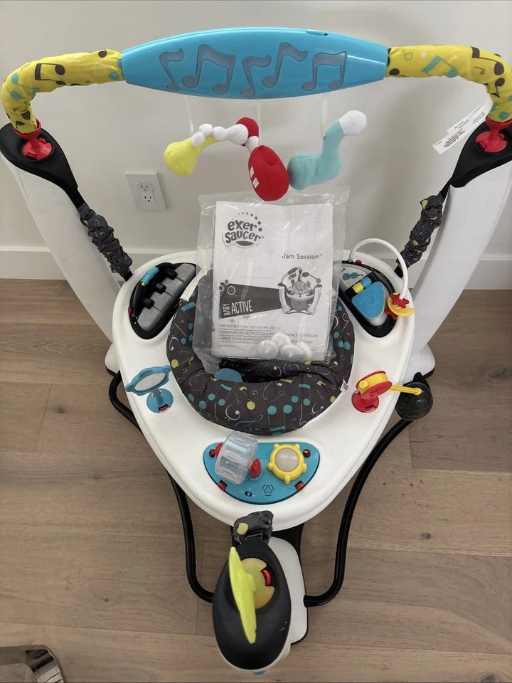 Evenflo ExerSaucer Saltar y Aprender Jam Saltar Actividad Bebé Jumper (Caja Abierta) Foto 2 de 4