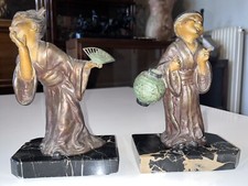 Geo MAXIM : Serre-livres en régule figurant des enfants d'Asie Signés