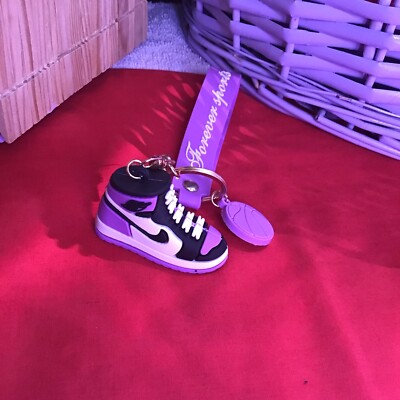 purple nike keychain