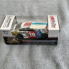 Kyle Busch 2016 18 M M  s Red, White  Blue 1/64th Diecast.