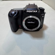 Fotocamera reflex digitale PENTAX K100D testata solo corpo nero buone condizioni