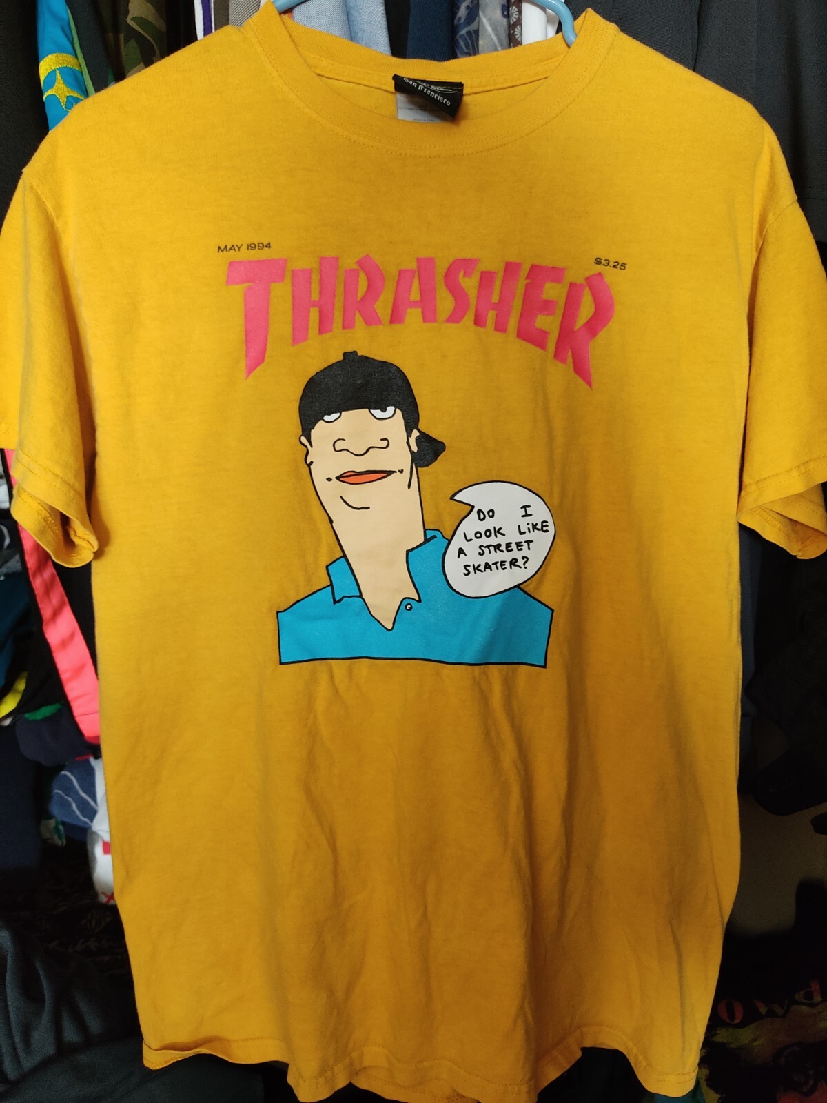 A selection of vintage Thrasher shirts, including rare designs from the 1990s