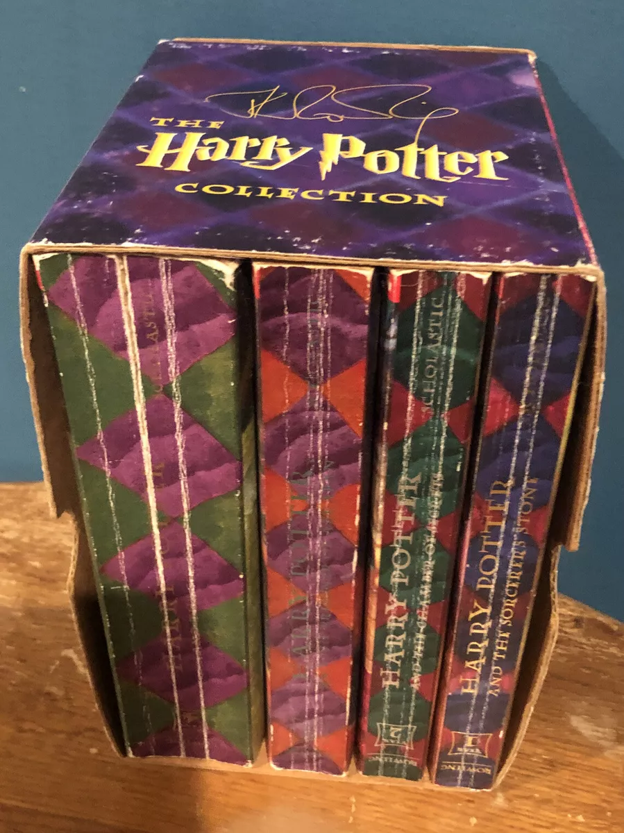 Boxed Set Harry Potter Paperback (Books 1-4) Scholastic copyright 1999 by J. K. Rowling, Paperback