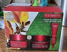 CLARINS SUPER RESTORATIVE AGE DEFENSE TRIO- B...