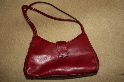 fossil womens small red leather bag. 12x8x3. 11" strap.