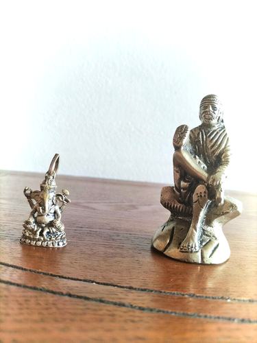 Brass Durga Statue Sitting on Lion, Shirdi Sai Baba Statue and  Ganesh Pendant - Imagen 7 de 11