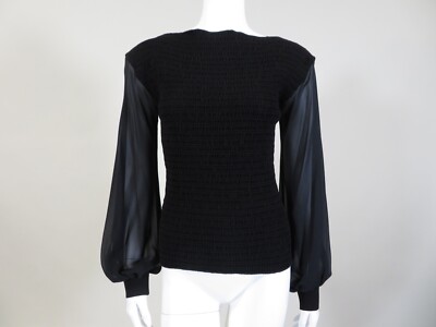 black blouse with sheer sleeves