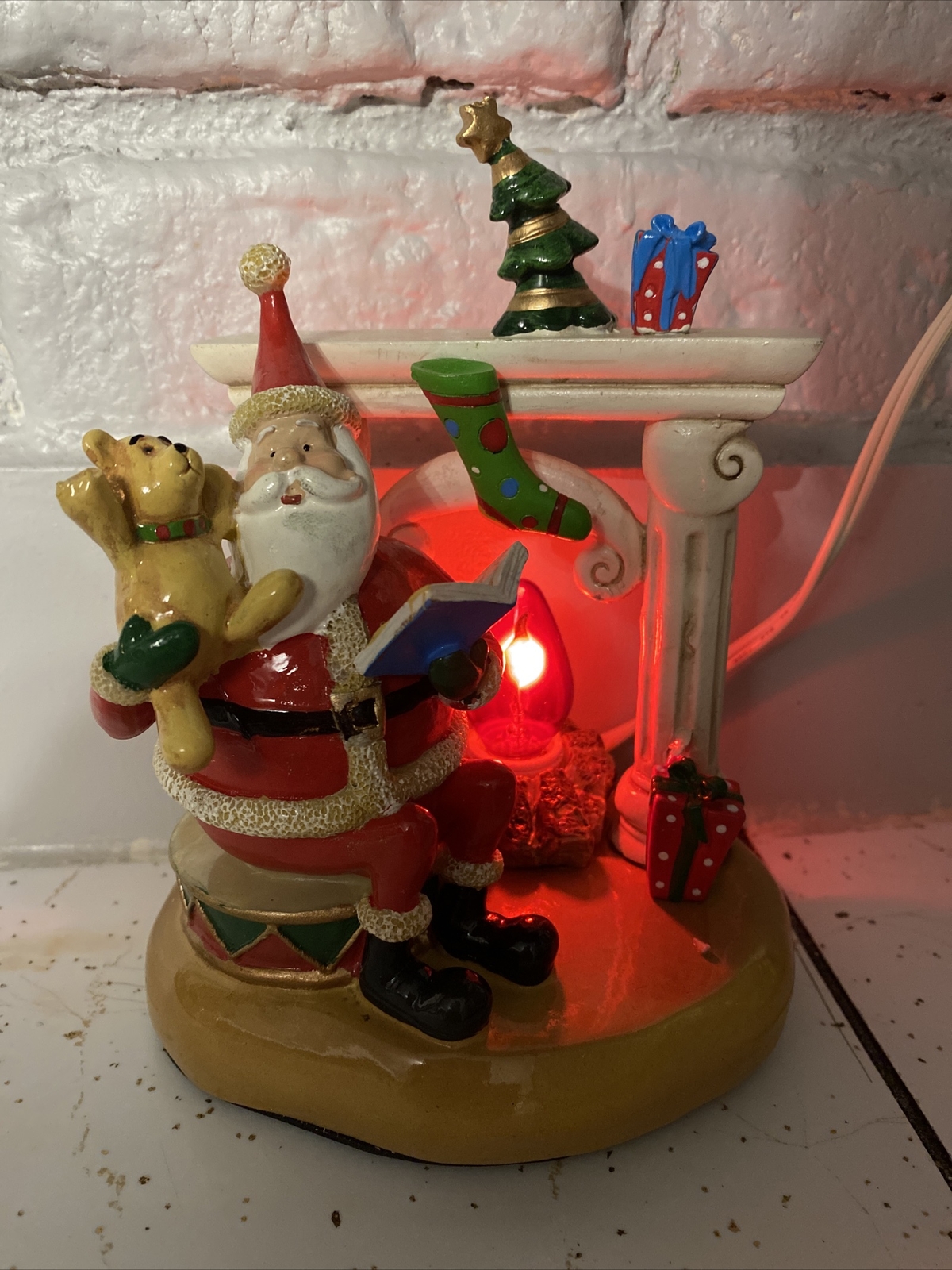 Kirklands home Santa by chimney with teddy bear and presents Flicker