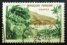France 850 used 1957 8F Sens River Guadeloupe men in boat beach scene ferns