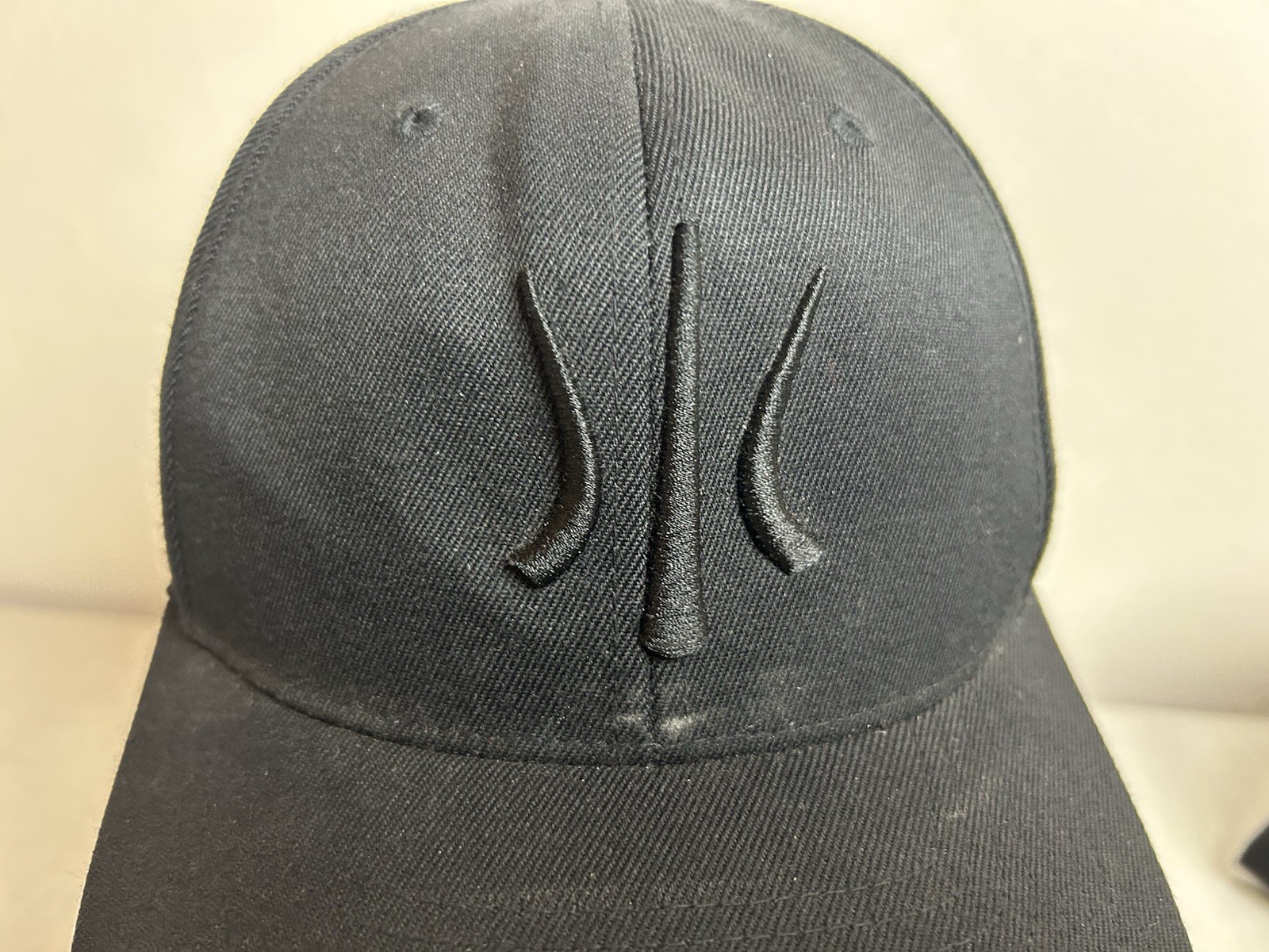 Rhone Black Flexfit Performance Cap Embroidered L… - image 1