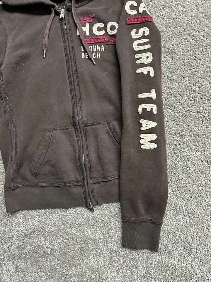Sudadera con Capucha Y2K Años 2000 Holister Bordada Para Mujer Marrón Cremallera HCO *DEFECTOS* Mediana M Foto 4 de 4