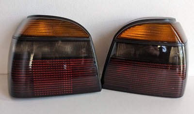 VW Golf Mk3 Smoked Facelift Tail Lights | HELLA | 1H6945111