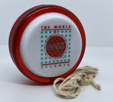 Genuine Russell Spinner - Coca-Cola - The World Of Atlanta.