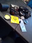A Selection of Various Cameras & Lenses And Cleaning Lens