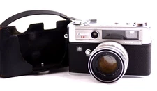 VINTAGE YASHICA LYNX 5000E RANGEFINDER CAMERA WITH 4.5cm F1.8 LENS AND HALF CASE