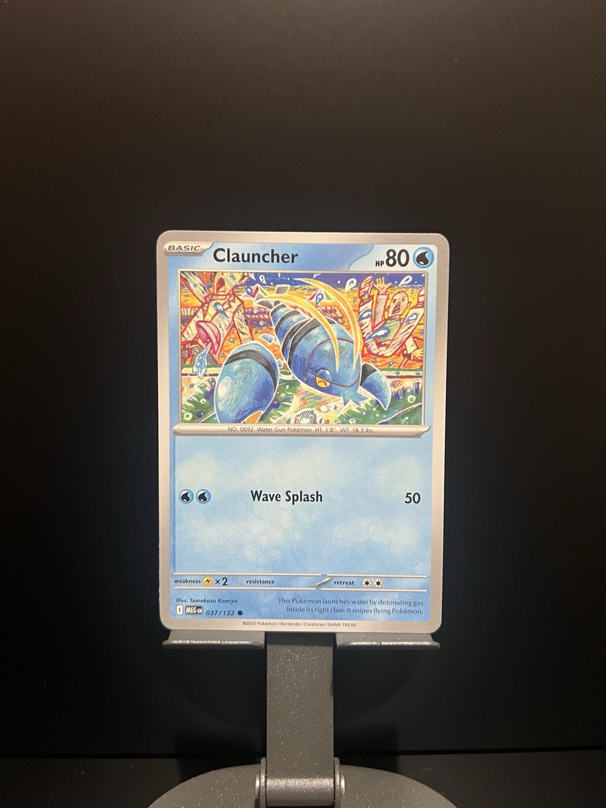 Clauncher 037/132 Mega Evolution Common Tomokazu Komiya