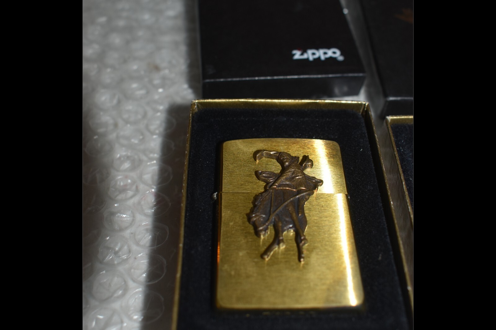 2 Zippo lighters, bronze marlboro man and BULL, collectible quality