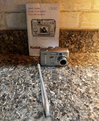 Kodak EasyShare CX7430 4MP Point & Shoot 3x Optical Zoom 1.8'' USB AA Silver