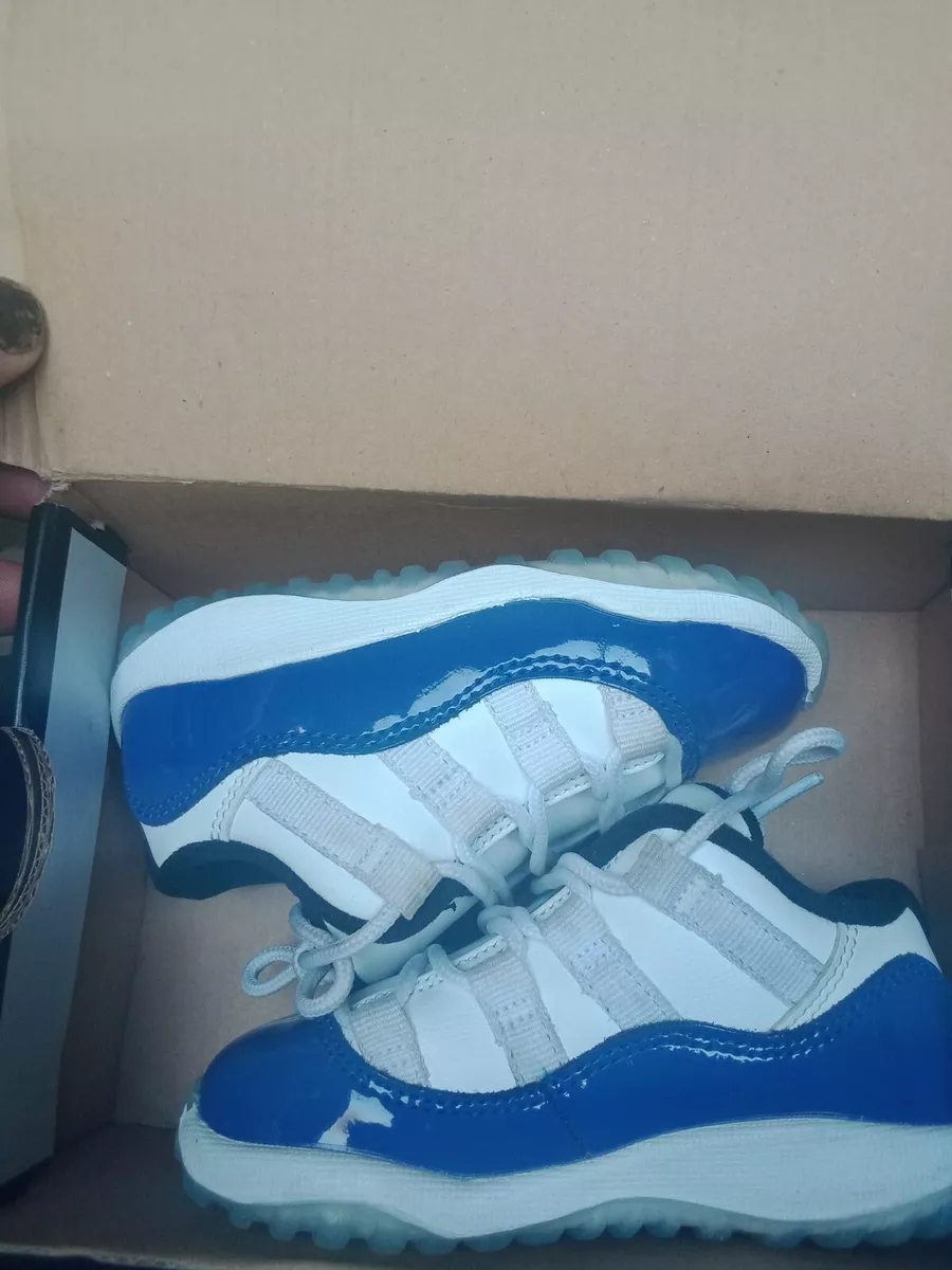 Baby blue and white hotsell jordan 11