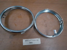 FIAT 850 COUPE' 2° SERIE COPPIA CORNICI FARI INTERNI  NUOVE ORIGINALI