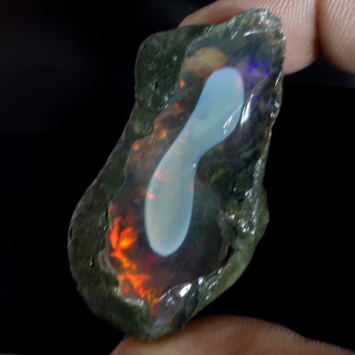 106,60 Cts. Olio di opale etiope naturale esemplare grezzo ultra "gioco di colori" gemme - Foto 4 di 8