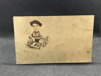 RPPC STUDIO COMIC FOREGROUND MAN DRIVING A CAR 