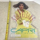 Vintage "Surprising" Capri Cigarettes Super Slims Tin Metal Sign 18" x 11.5"