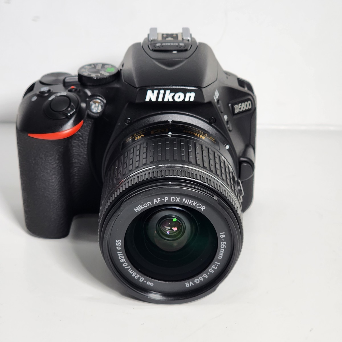 Nikon D5600 DSLR Camera with 18-55mm 1576 Lens Battery Top