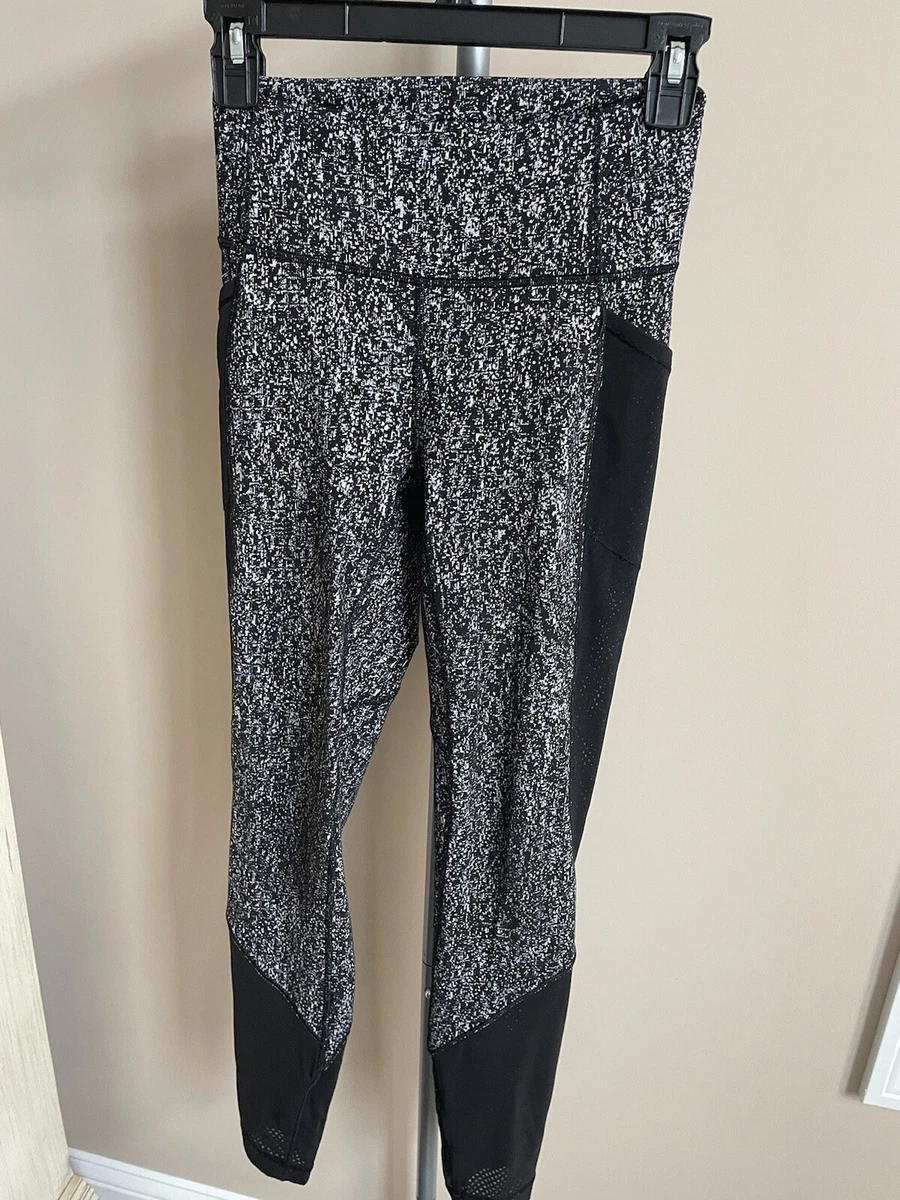 Lululemon Black & White speckled tights with mesh side pockets size 4