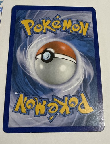 Reverse holo Herdier 109/146 XY Pokémon card with gold border, blue swirl background, and orange “Pokémon” text.