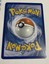 Reverse holo Herdier 109/146 XY Pokémon card with gold border, blue swirl background, and orange “Pokémon” text.