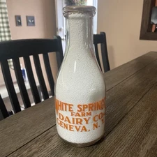 White Springs Farm Dairy Co. Geneva N.Y War Bonds Milk Bottle Rare