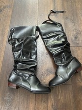Women  s black tie boots size 10