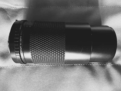 OBJECTIF SUN ZOOM 70-140MM F:3.8 AVEC ETUI ET FILTRE POSSO - Photo 1/4