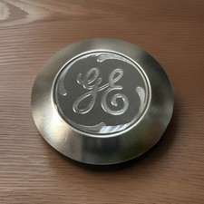 GE Badge Nameplate WR04X10143, 1.40"DIA x 0.17" Thick, Satin finish, OEM NEW