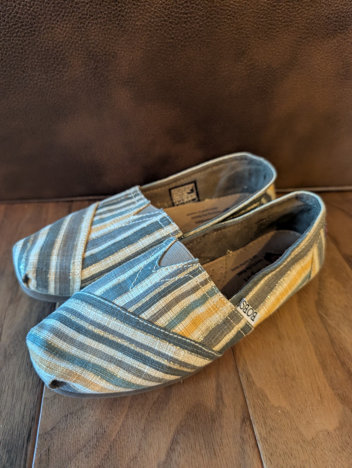 Bobs By Skechers Woman’s Slip On Shoes, Size 6, Gold tone shimmer/stripes