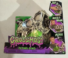 MGA Entertainment GrossMos Flying Dino Tap, Rock Roar, Fly. Blue Dino