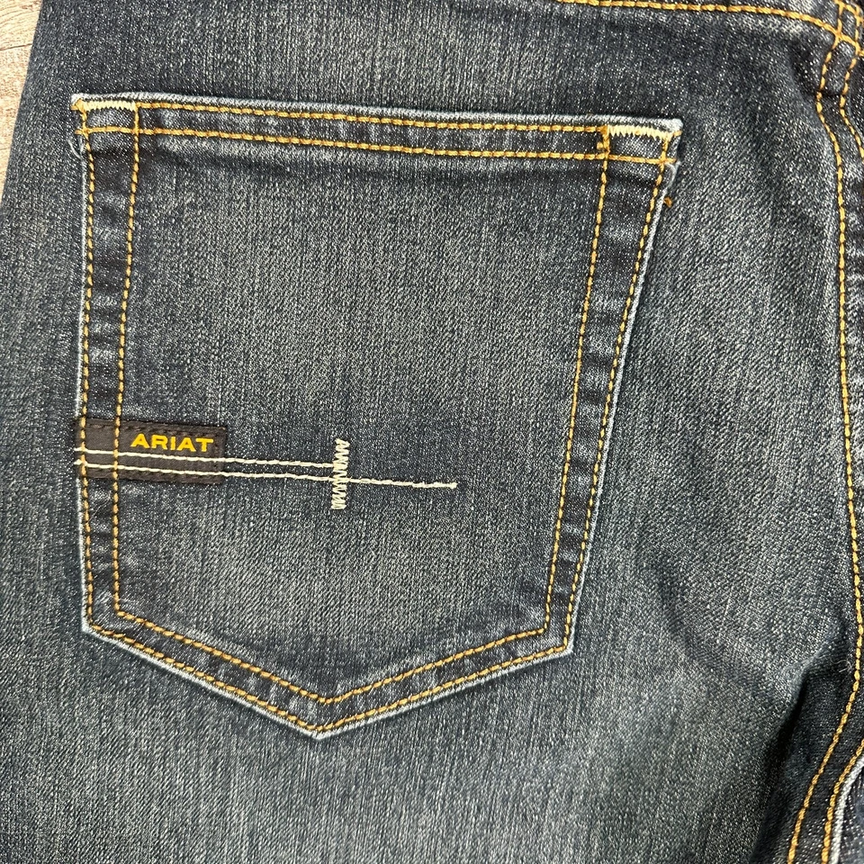 NUEVO CON ETIQUETAS Ariat Rebar M4 2X Pantalones de mezclilla duraderos tiro bajo corte bota para hombre 32x32 ropa de trabajo Foto 4 de 4