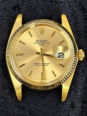 1959 Rolex Oyster Perpetual Date 1503 34mm 14K Yellow Gold Champagne Dial