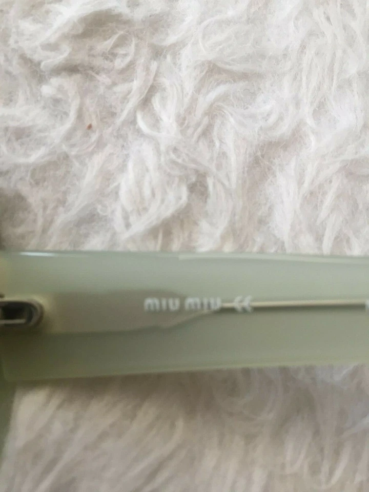 Óculos de sol feminino Miu Miu, SMU20E - Imagem 3 de 4