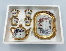 Chinese porcelain gold trimmed Tea pot and 4 Cup set w/ dragon  Phoenix Tray