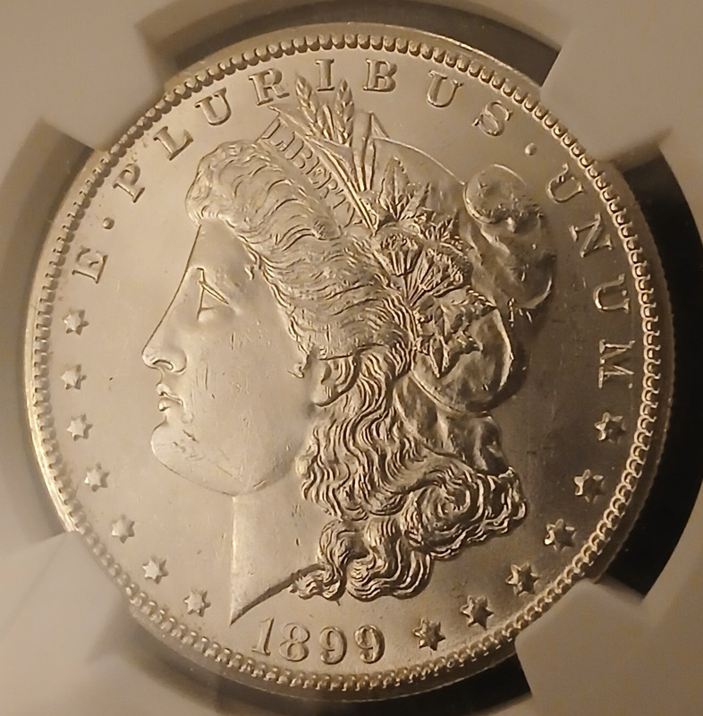 1899 O (NEW ORLEANS) BU MORGAN SILVER DOLLAR (NGC) WRAPPED & IN ORIGINAL CASE