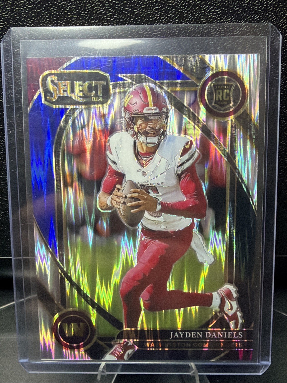 2024 Select - Club Level Jayden Daniels #217 Black & Blue Shock Prizm (RC)