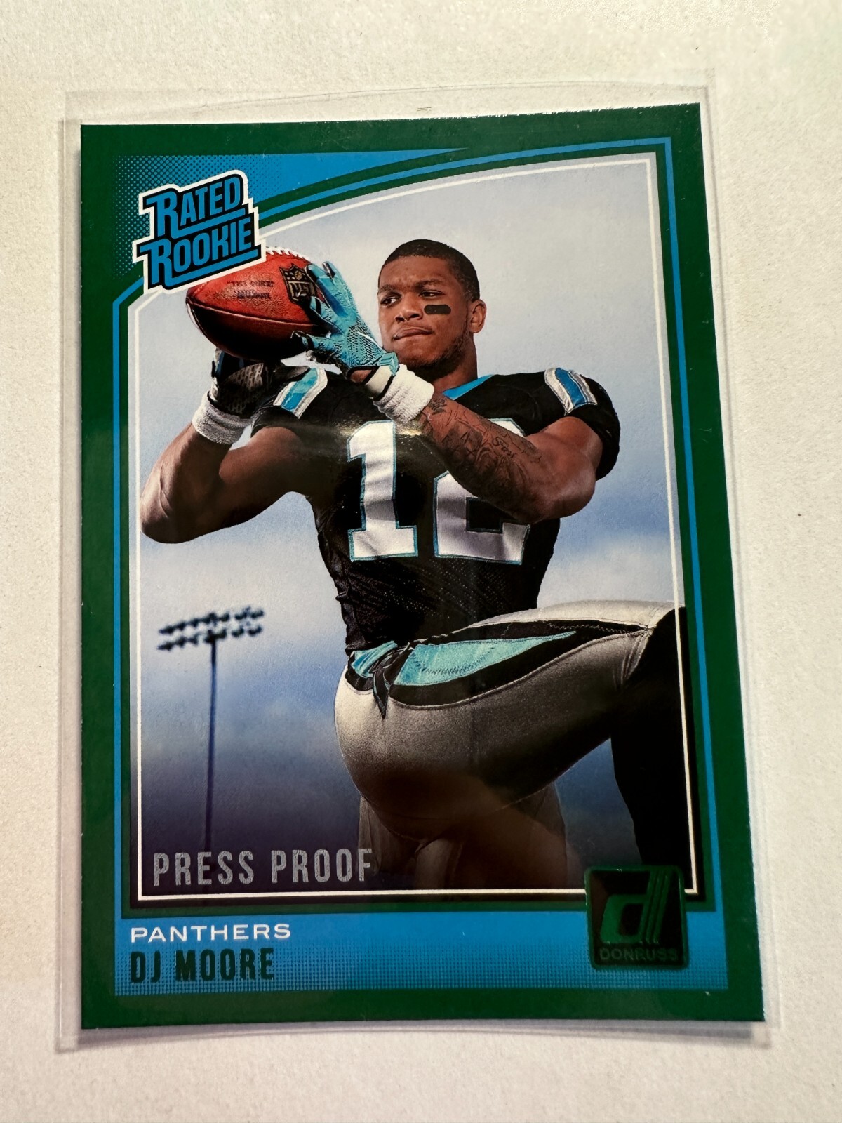 K21,071 - 2018 Donruss Press Proof Green #316 D.J. Moore RR