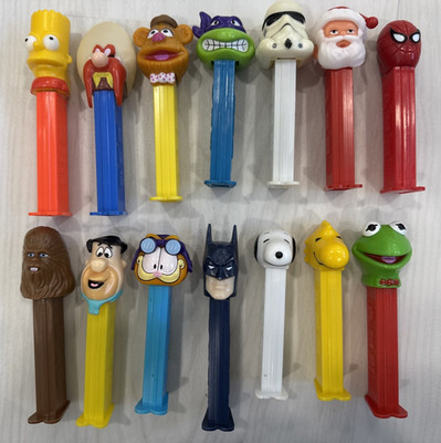 14 Assorted Pez Containers With Feet: Bart Simpson,Snoopy,Garfield, Batman etc..
