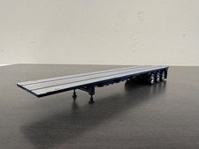 Remolque de plataforma plana de tres ejes 1/64 DCP/primera marcha - negro con plataforma plateada