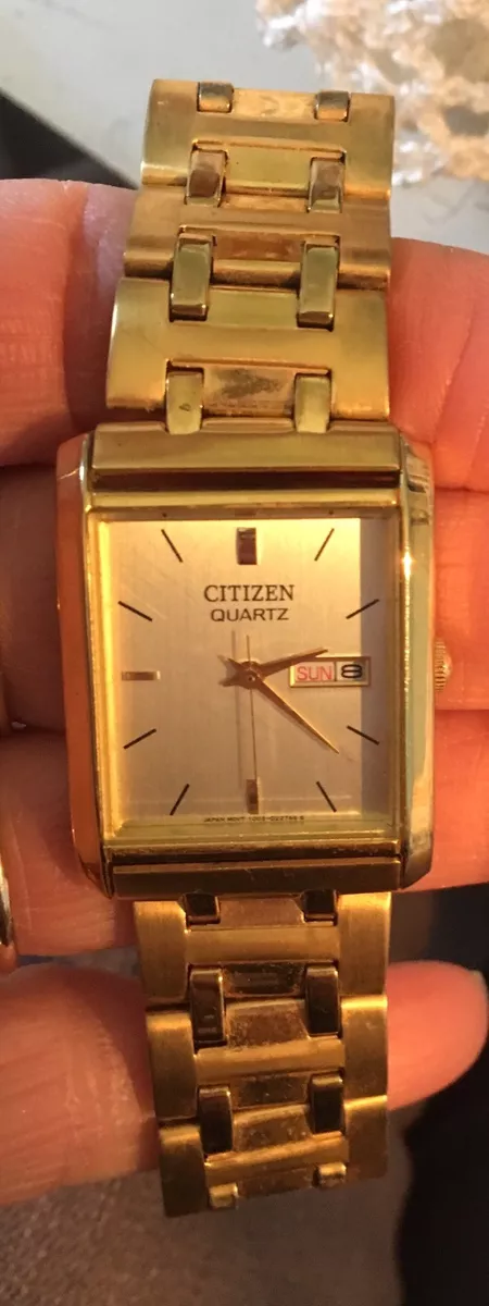 Orologio rettangolare oro sale