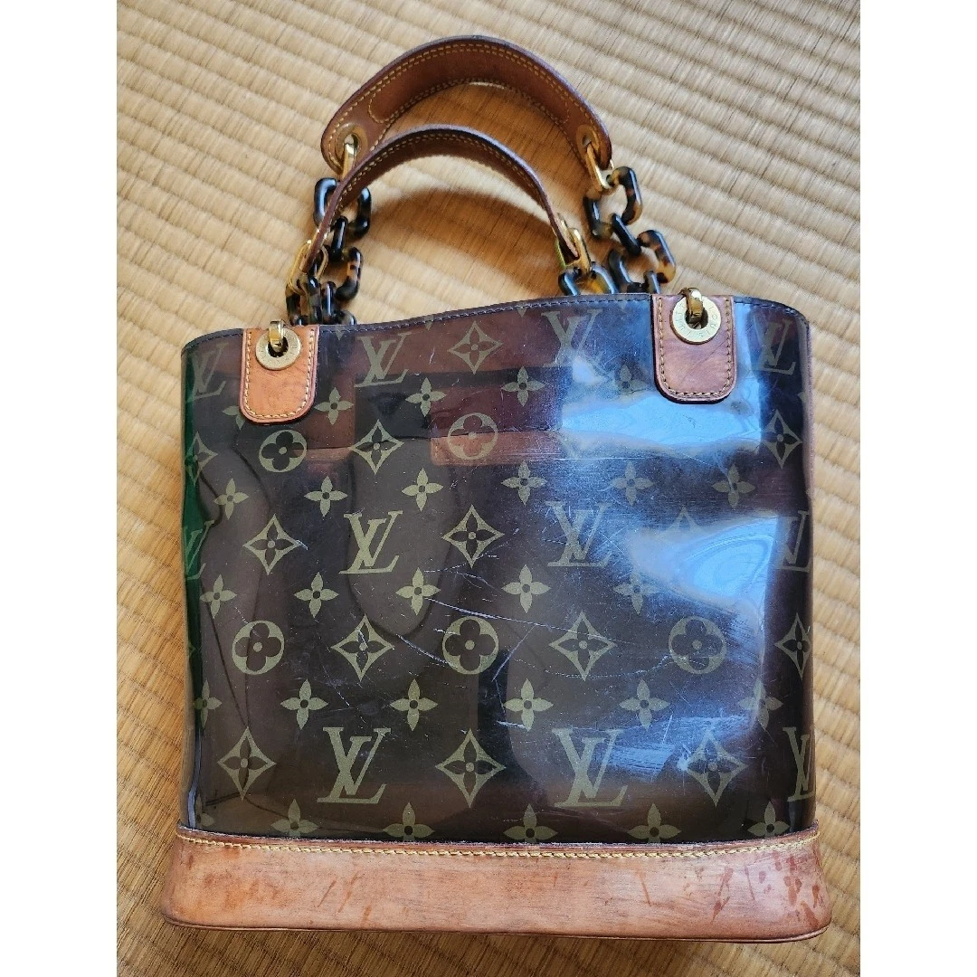 Preços baixos em Bolsas e Sacolas Louis Vuitton Transparente para