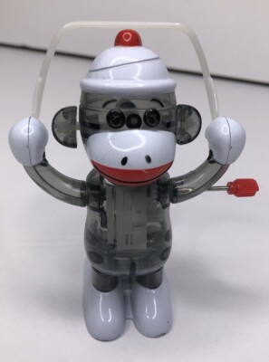 Sock Monkey Wind-Up Toy Plastic Jumprope Hopping Moveable Black White Red 4x2.75
